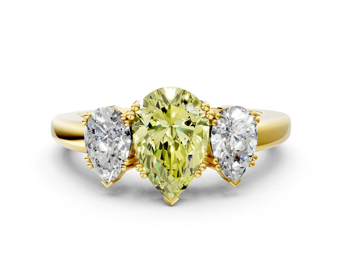 Yellow gold Three-Stone Fancy Yellow Pear Cut Cut Diamond Ring with Channel Set Band and Four-Prong Setting