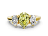 Yellow gold Three-Stone Fancy Yellow Pear Cut Cut Diamond Ring with Channel Set Band and Four-Prong Setting_24