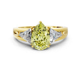 Yellow gold Three-Stone Fancy Yellow Pear Cut Cut Diamond Ring with Trillion Side Stones on a Split Shank Band