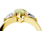 Yellow gold Three-Stone Fancy Yellow Pear Cut Cut Diamond Ring with Trillion Side Stones on a Split Shank Band_4