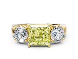 Yellow gold Three-Stone Fancy Yellow Princess Cut Diamond Ring with Round Side Stones, Classic Band, and Four-Prong Setting