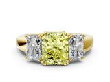 Yellow gold Three-Stone Fancy Yellow Radiant Cut Cut Diamond Ring with Channel Set Band and Four-Prong Setting