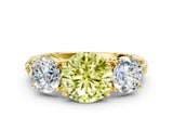 Yellow gold Three-Stone Fancy Yellow Round Cut Cut Diamond Ring with Channel-Set Band and Prong Setting