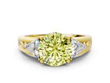 Yellow gold Three-Stone Fancy Yellow Round Cut Cut Diamond Ring with Trillion Side Stones on a Split Shank Band