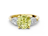 Yellow gold Three-Stone Fancy Yellow Round  Diamond Ring with Pear Side Stones in Four-Prong Setting