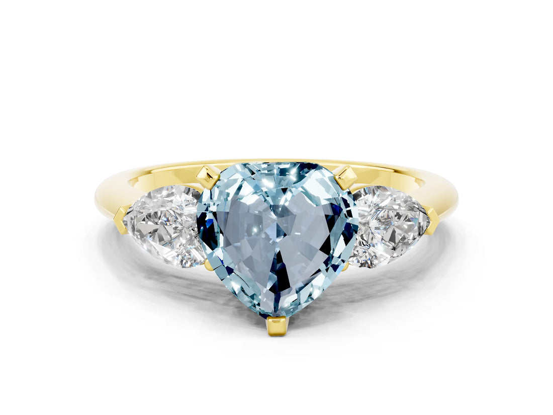 Yellow gold Three-Stone Heart Cut Aquamarine Ring with Pear Side Stones and Four-Prong Setting