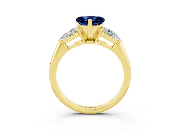 Yellow gold Three-Stone Heart Cut Blue Sapphire Ring with Pear Side Stones and Four-Prong Setting