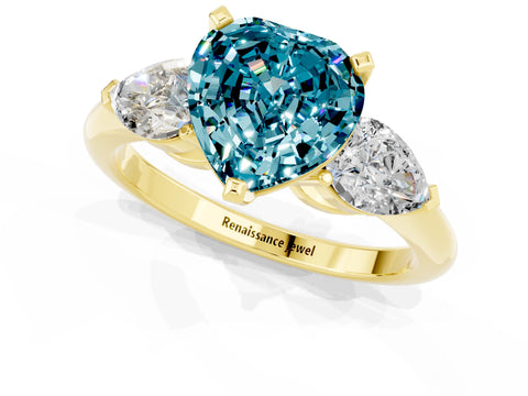 Yellow gold Three-Stone Heart Cut Blue Topaz Ring with Pear Side Stones and Four-Prong Setting_1