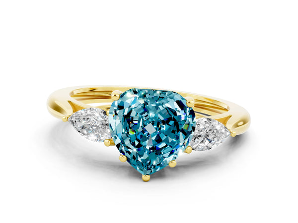 Yellow gold Three-Stone Heart Cut Blue Topaz Ring with Pear  Side Stones in Four-Prong Setting