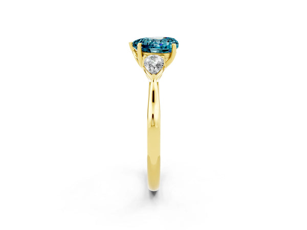 Yellow gold Three-Stone Heart Cut Blue Topaz Ring with Pear  Side Stones in Four-Prong Setting