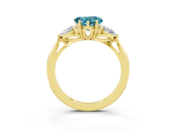 Yellow gold Three-Stone Heart Cut Blue Topaz Ring with Pear  Side Stones in Four-Prong Setting