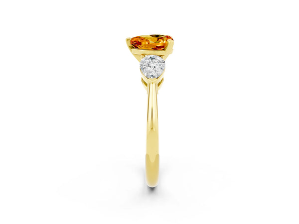 Yellow gold Three-Stone Heart Cut Citrine Ring with Pear Side Stones and Four-Prong Setting