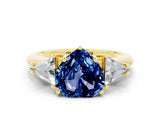 Yellow gold Three-Stone Heart Cut Cut Diamond Ring with Trillion Side Stones and Four-Prong Setting