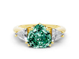 Yellow gold Three-Stone Heart Cut Cut Diamond Ring with Trillion Side Stones and Four-Prong Setting