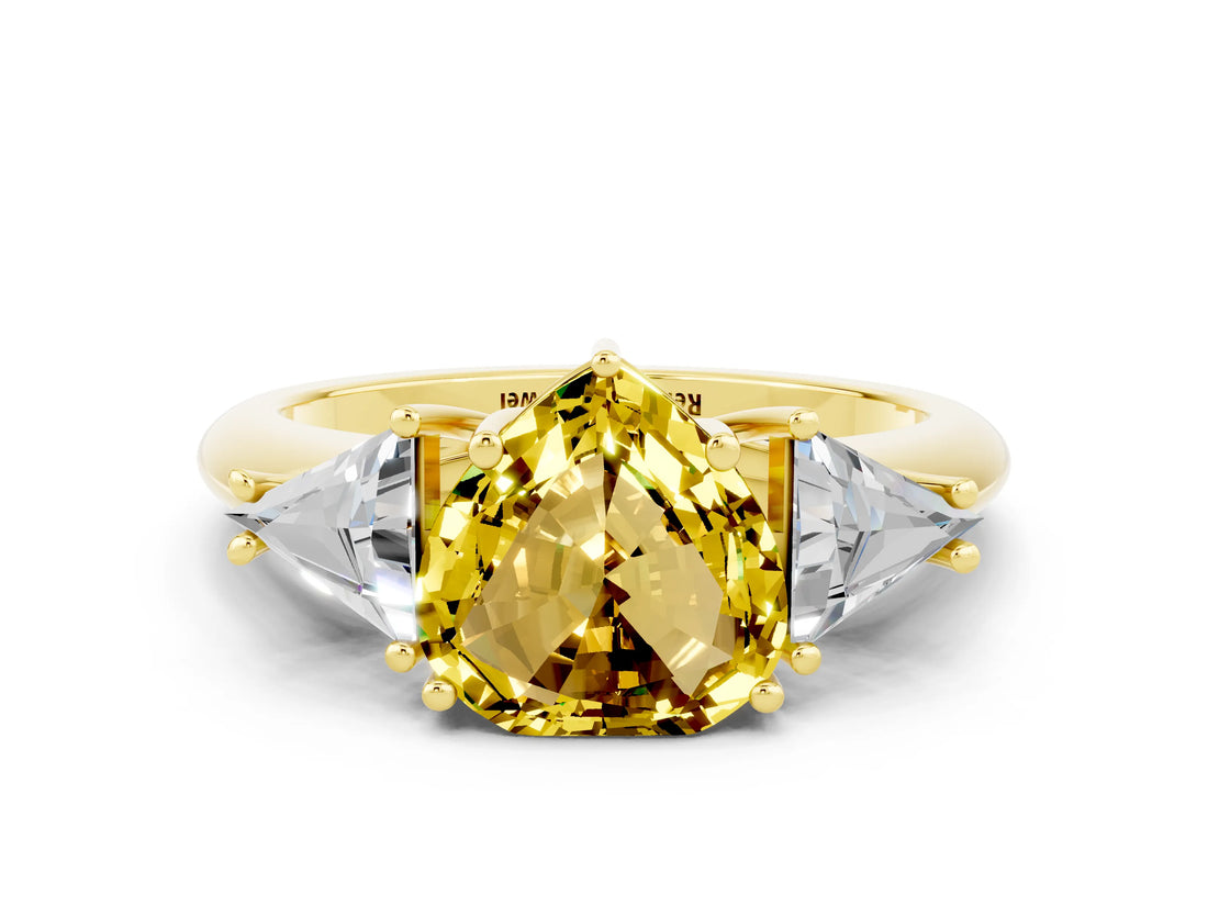 Yellow gold Three-Stone Heart Cut Cut Diamond Ring with Trillion Side Stones and Four-Prong Setting