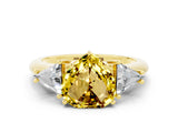 Yellow gold Three-Stone Heart Cut Cut Diamond Ring with Trillion Side Stones and Four-Prong Setting