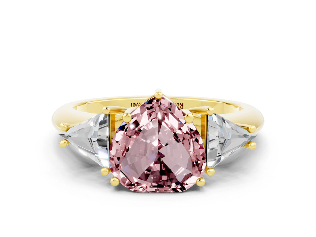 Yellow gold Three-Stone Heart Cut Cut Diamond Ring with Trillion Side Stones and Four-Prong Setting