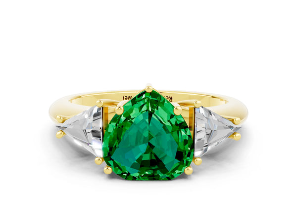 Yellow gold Three-Stone Heart Cut Emerald Engagement Ring with Trillion Side Stones and Prong Setting
