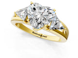 Yellow gold Three-Stone Heart Cut Cut Diamond Ring with Trillion Side Stones on a Split Shank Band_16