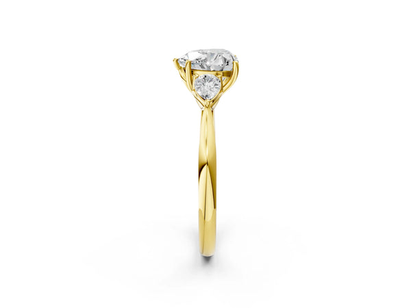Yellow gold Three-Stone Heart Cut Diamond Ring with Pear  Side Stones in Four-Prong Setting