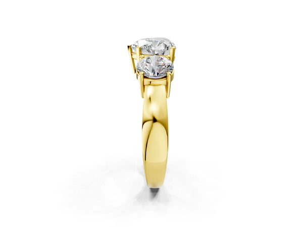 Yellow gold Three-Stone Heart Cut Diamond Ring with Round Side Stones, Classic Band, and Four-Prong Setting