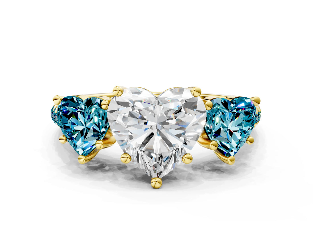 Yellow gold Three-Stone Heart Cut Diamond Ring with Round with Blue Topaz side stone Pavé Band and Prong Setting