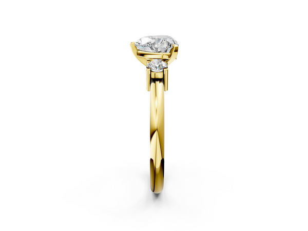Yellow gold Three-Stone Heart Cut Diamond Solitaire with Prong Setting and Classic Band