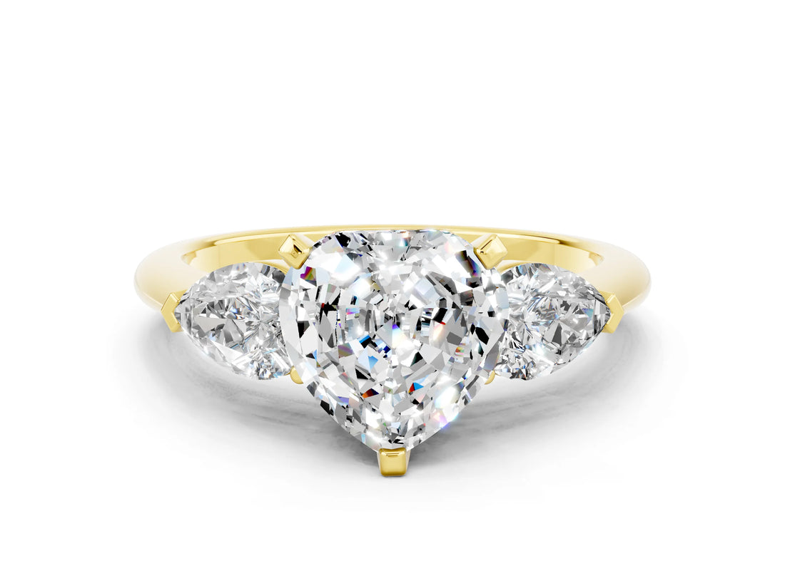 Yellow gold Three-Stone Heart Cut Moissanite Ring with Pear Side Stones and Four-Prong Setting