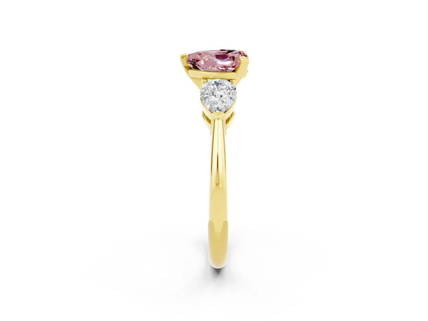 Yellow gold Three-Stone Heart Cut Morganite Ring with Pear Side Stones and Four-Prong Setting
