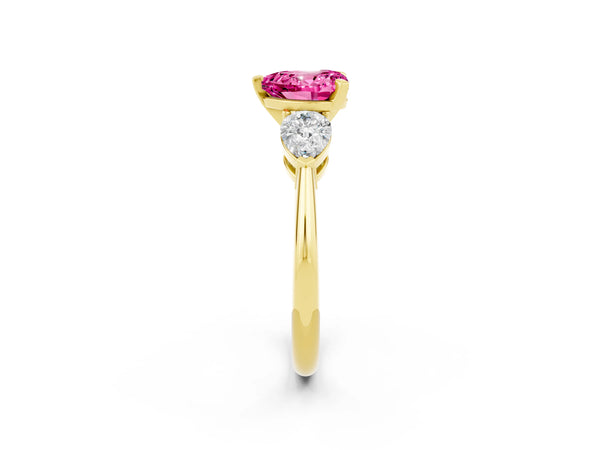 Yellow gold Three-Stone Heart Cut Pink Sapphire Ring with Pear Side Stones and Four-Prong Setting