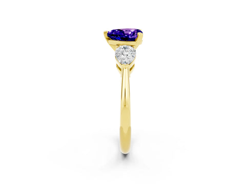 Yellow gold Three-Stone Heart Cut Tanzanite Ring with Pear Side Stones and Four-Prong Setting_2