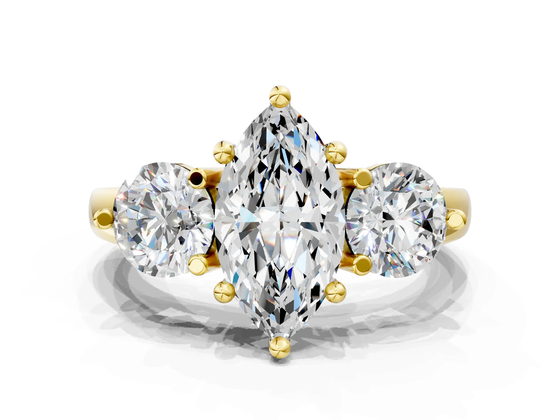 Yellow gold Three-Stone Marquise Brilliant Cut Solitaire Ring with Prong Setting on a Classic Band
