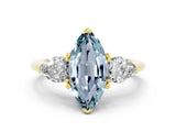 Yellow gold Three-Stone Marquise Cut Aquamarine Ring with Pear Side Stones and Four-Prong Setting
