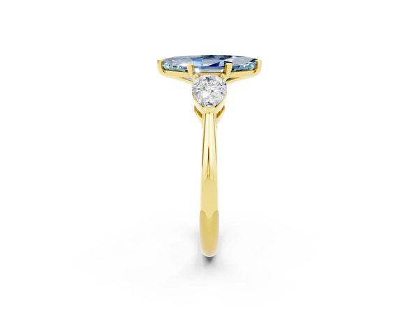 Yellow gold Three-Stone Marquise Cut Aquamarine Ring with Pear Side Stones and Four-Prong Setting