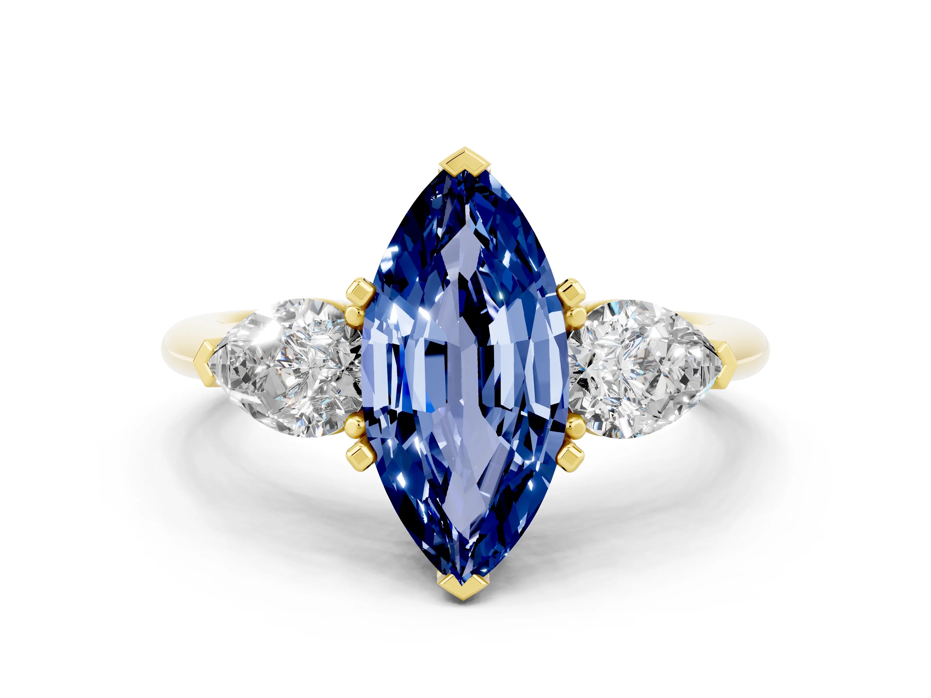 Yellow gold Three-Stone Marquise Cut Blue Sapphire Ring with Pear Side Stones and Four-Prong Setting