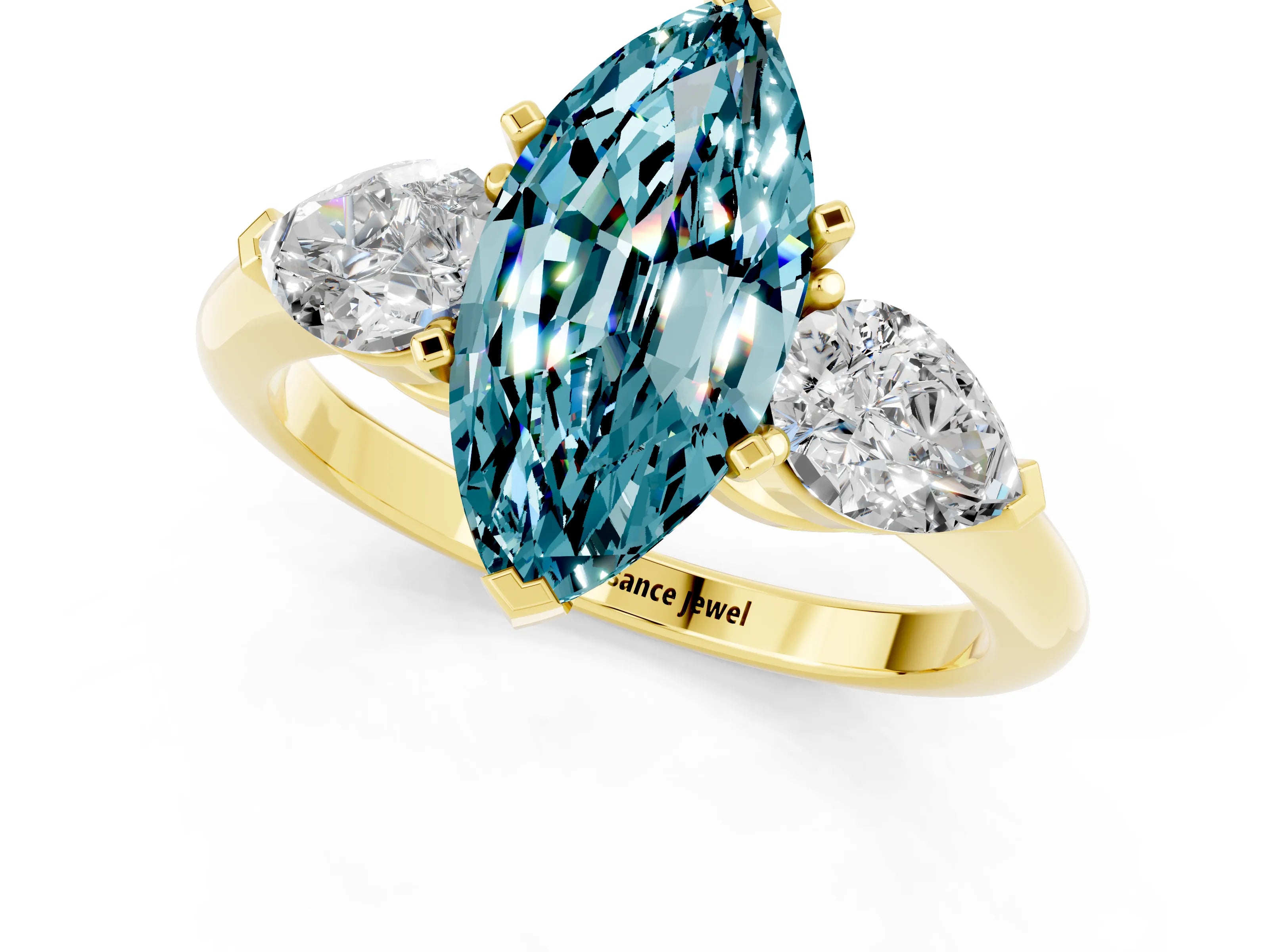 Yellow gold Three-Stone Marquise Cut Blue Topaz Ring with Pear Side Stones and Four-Prong Setting_1