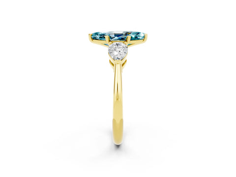 Yellow gold Three-Stone Marquise Cut Blue Topaz Ring with Pear Side Stones and Four-Prong Setting_2