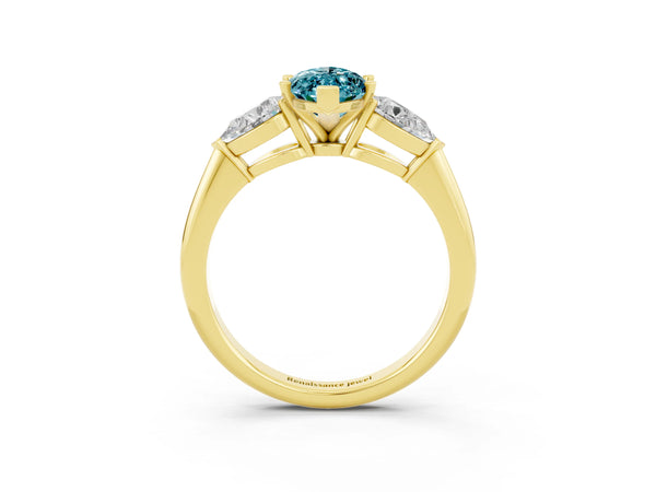 Yellow gold Three-Stone Marquise Cut Blue Topaz Ring with Pear Side Stones and Four-Prong Setting