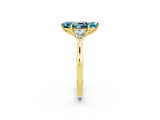 Yellow gold Three-Stone Marquise Cut Blue Topaz Ring with Pear  Side Stones in Four-Prong Setting_14
