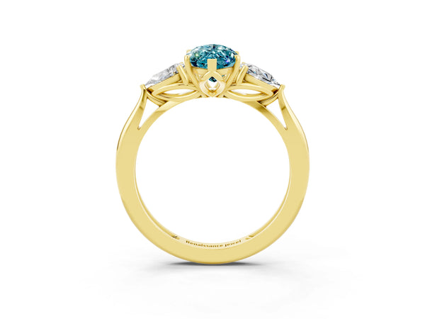 Yellow gold Three-Stone Marquise Cut Blue Topaz Ring with Pear  Side Stones in Four-Prong Setting