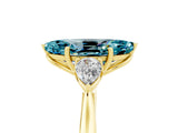 Yellow gold Three-Stone Marquise Cut Blue Topaz Ring with Pear  Side Stones in Four-Prong Setting_17