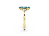 Yellow gold Three-Stone Marquise Cut Blue Topaz Ring with Pear  Side Stones in Four-Prong Setting_38