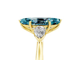 Yellow gold Three-Stone Marquise Cut Blue Topaz Ring with Pear  Side Stones in Four-Prong Setting_41