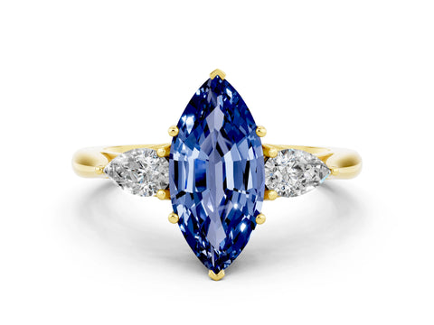 Yellow gold Three-Stone Marquise Cut Cut Diamond Ring with Pear Side Stones in Four-Prong Setting