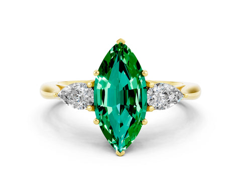 Yellow gold Three-Stone Marquise Cut Cut Diamond Ring with Pear Side Stones in Four-Prong Setting