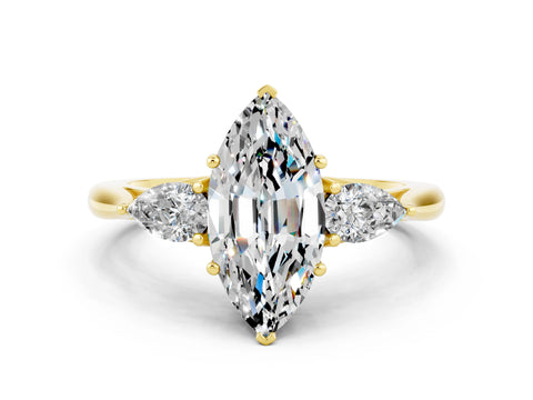 Yellow gold Three-Stone Marquise Cut Cut Diamond Ring with Pear Side Stones in Four-Prong Setting