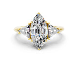Yellow gold Three-Stone Marquise Cut Cut Diamond Ring with Trillion Side Stones and Four-Prong Setting