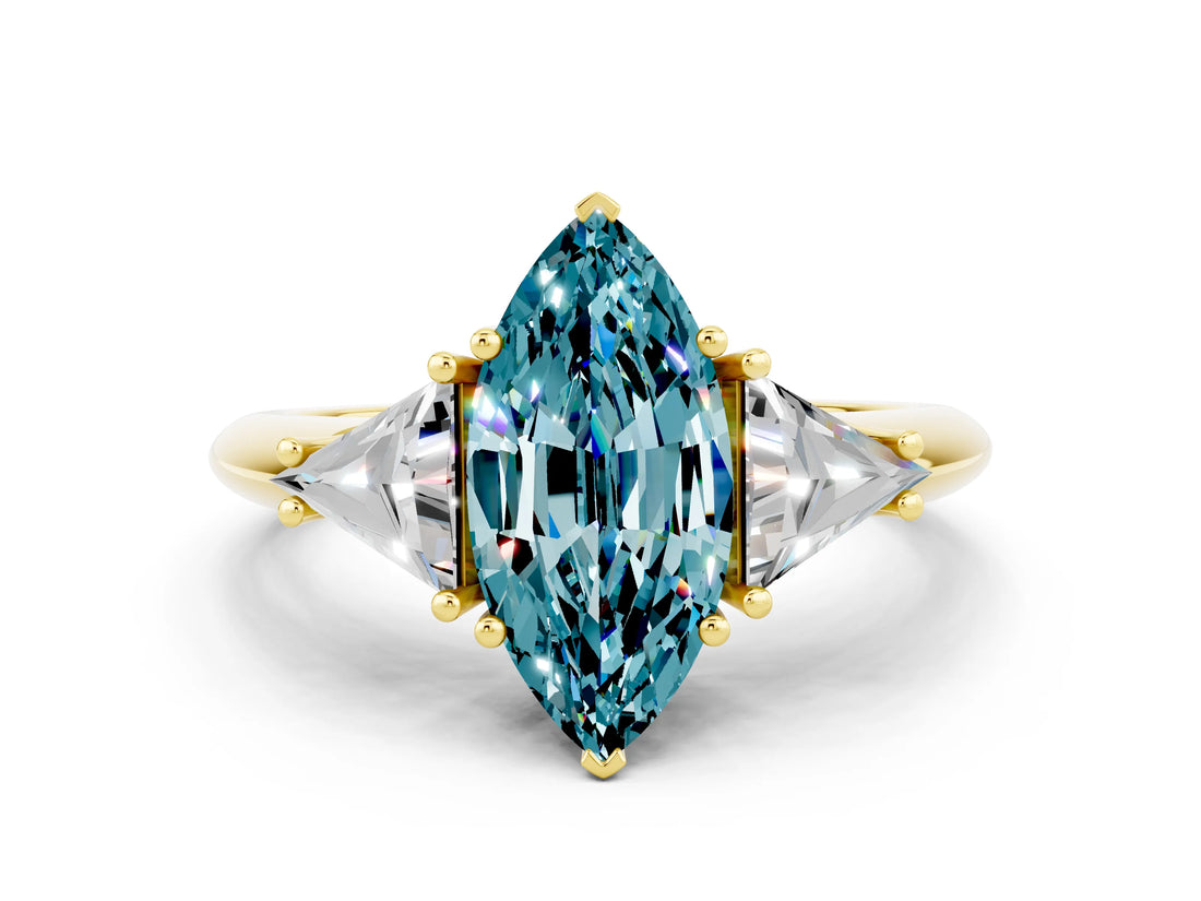 Yellow gold Three-Stone Marquise Cut Cut Diamond Ring with Trillion Side Stones and Four-Prong Setting