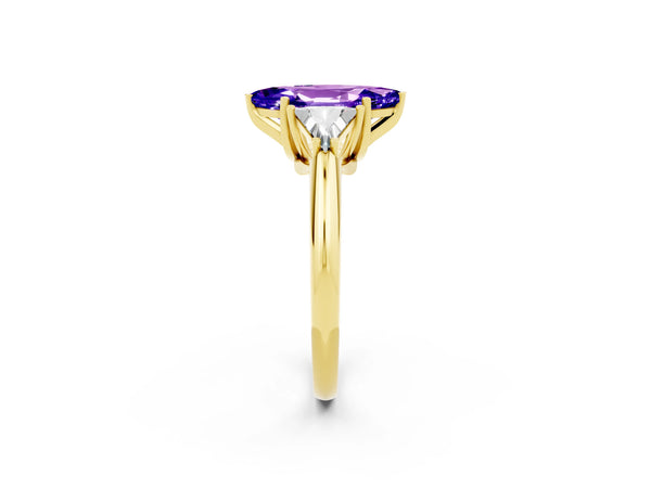 Yellow gold Three-Stone Marquise Cut Tanzanite Engagement Ring with Trillion Side Stones and Prong Setting