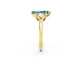 Yellow gold Three-Stone Marquise Cut Cut Diamond Ring with Trillion Side Stones and Four-Prong Setting_2